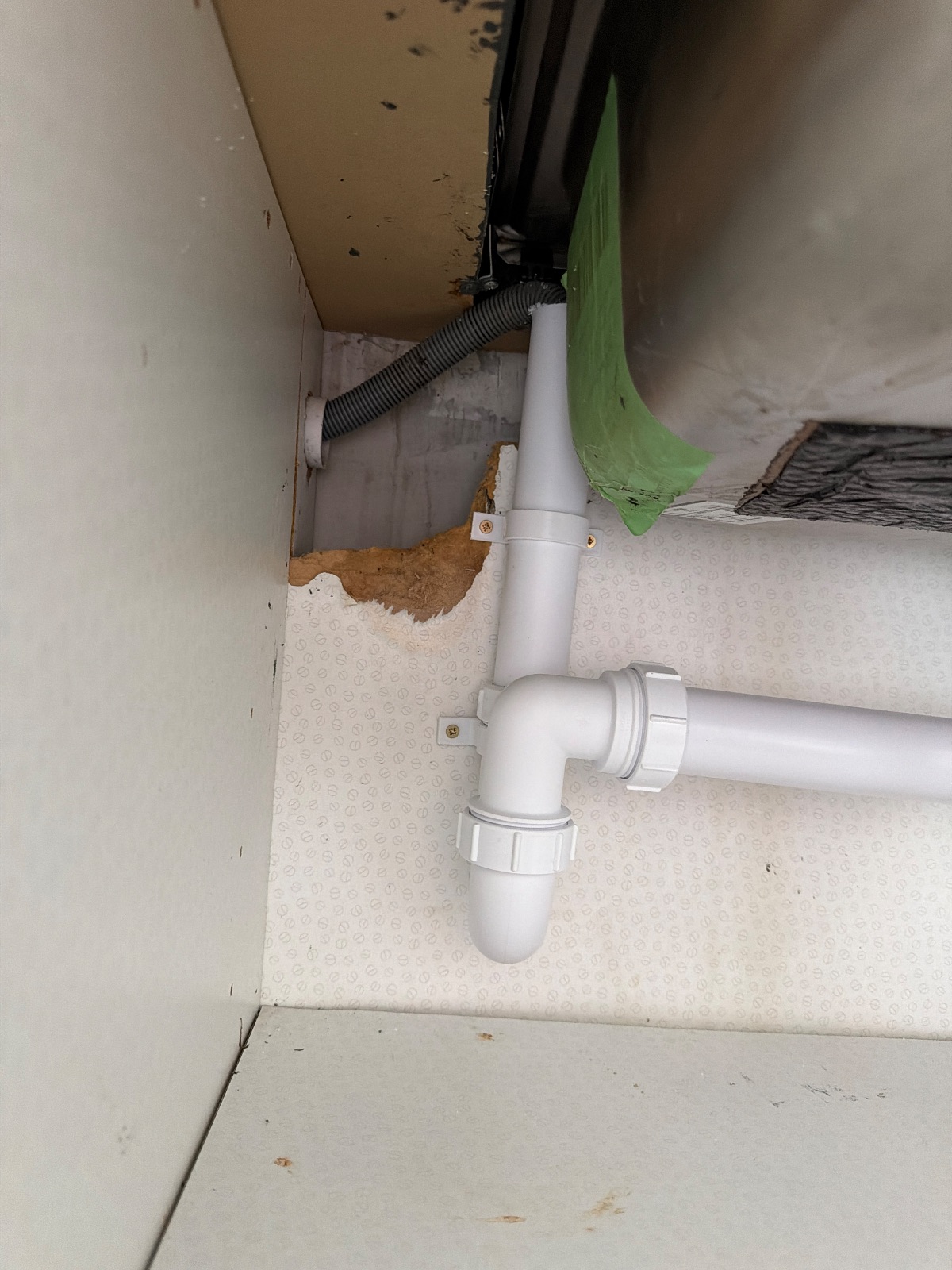 Under kitchen sink and washing machine outlet near Greencroft Ashington, Ashington — PK Plumbing