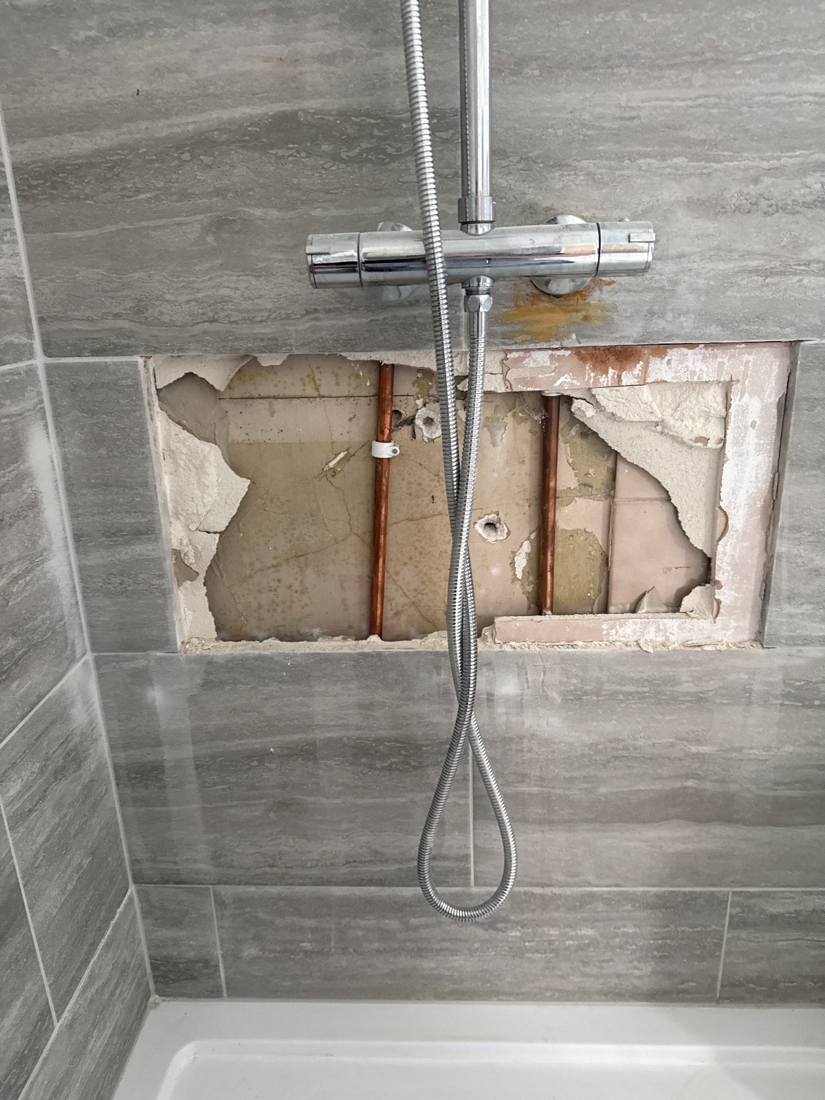 Emergency callout to water pouring through the ceiling, we arrived same day and isolated the water supply, our engineeer removed the tile carefully and repaired the leak. near Mitford Gardens, Newcastle upon Tyne — PK Plumbing